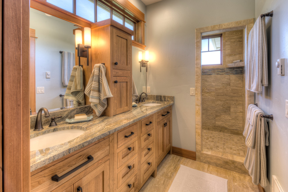 Photo of a large arts and crafts bathroom in Other with grey walls and limestone floors.