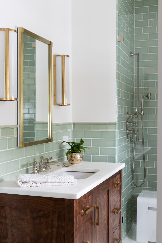 This is an example of a mid-sized traditional 3/4 bathroom in Chicago with green tile, ceramic tile, white benchtops, a single vanity, an alcove shower, ceramic floors, white floor, shaker cabinets, dark wood cabinets, white walls, an undermount sink and a shower seat.