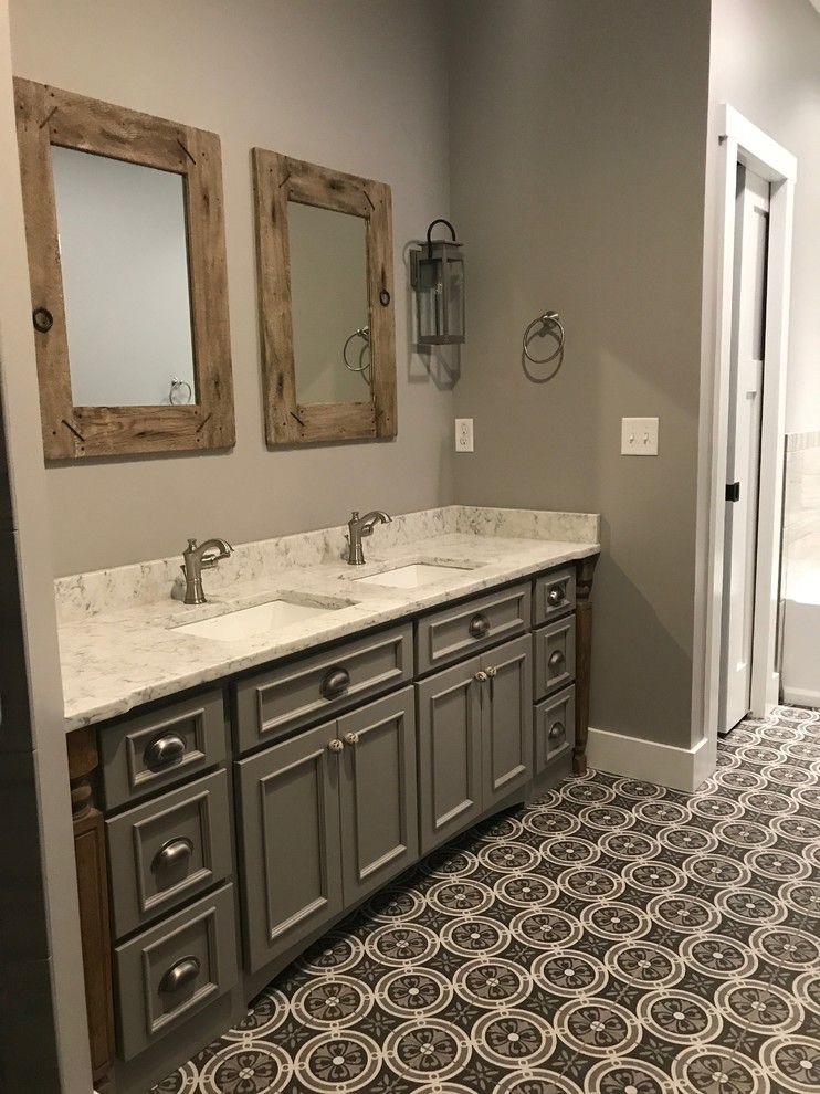 Inspiration for a mid-sized traditional master bathroom in Other with flat-panel cabinets, grey cabinets, ceramic floors, granite benchtops, grey floor and multi-coloured benchtops.