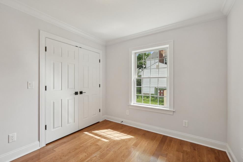 Bedroom with Double Closet and Window