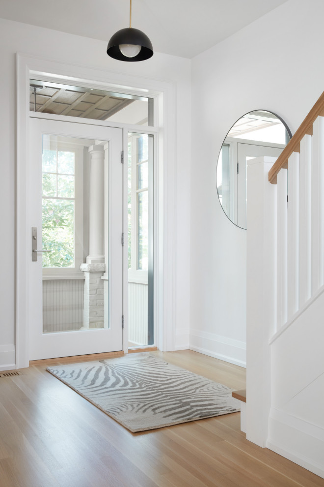Example of a transitional home design design in Toronto