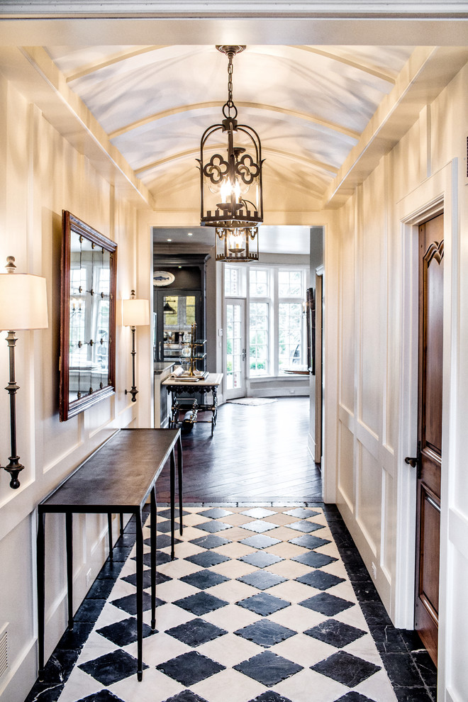 Traditional hallway in Chicago with white walls and black floor.