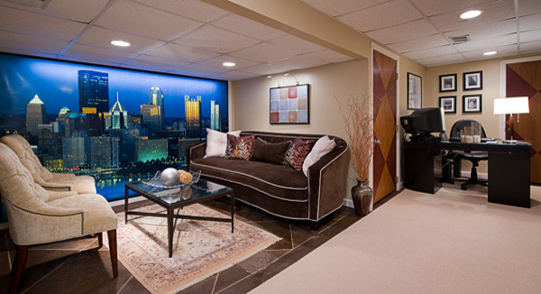 Example of a mid-sized transitional walk-out ceramic tile and brown floor basement design with beige walls and no fireplace