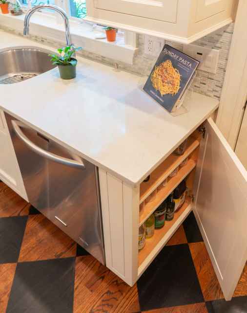 A side entry shallow base cab supports the dishwasher