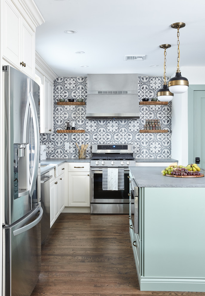 Design ideas for a mid-sized country l-shaped eat-in kitchen in New York with raised-panel cabinets, white cabinets, quartz benchtops, multi-coloured splashback, cement tile splashback, stainless steel appliances, with island and grey benchtop.