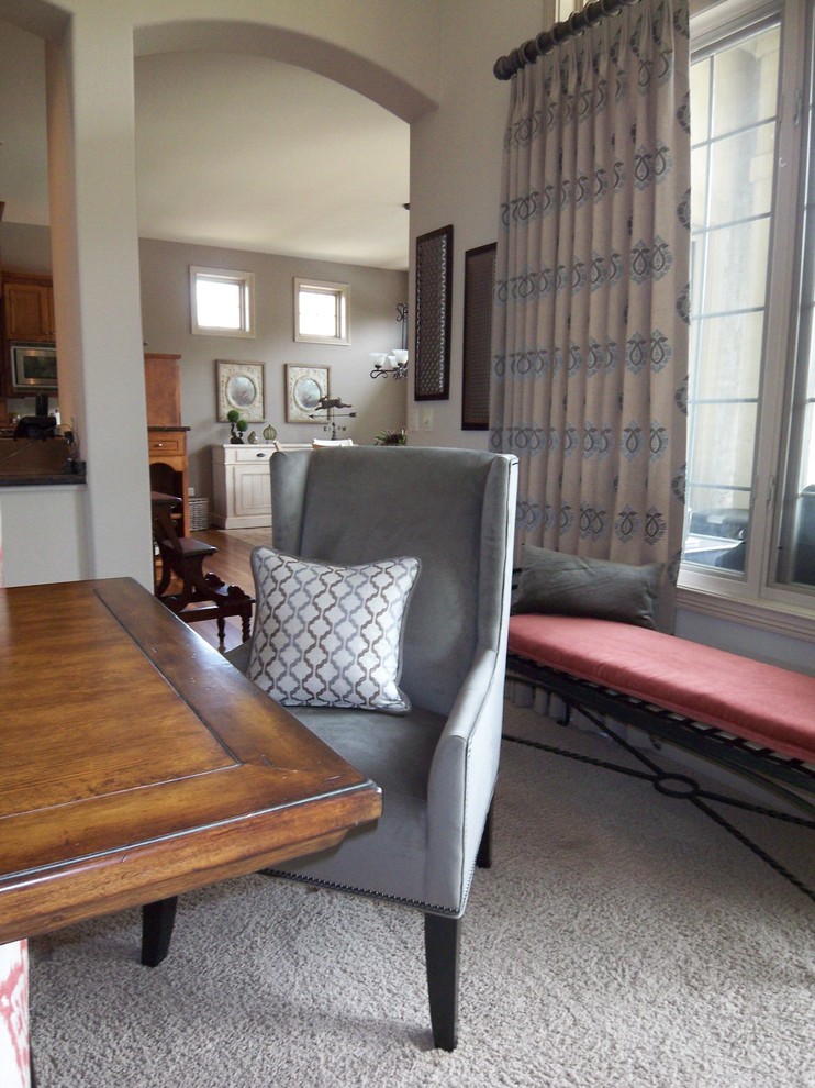This is an example of a contemporary dining room in Milwaukee.