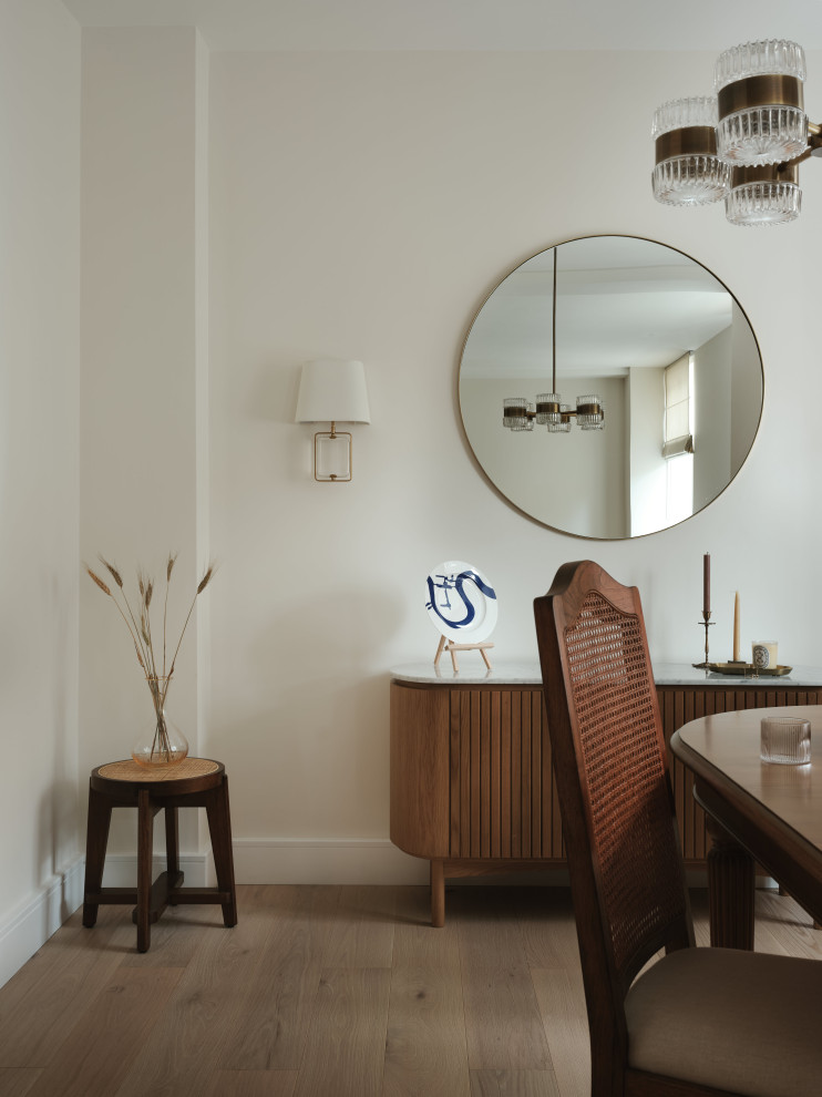 This is an example of a contemporary dining room in London.