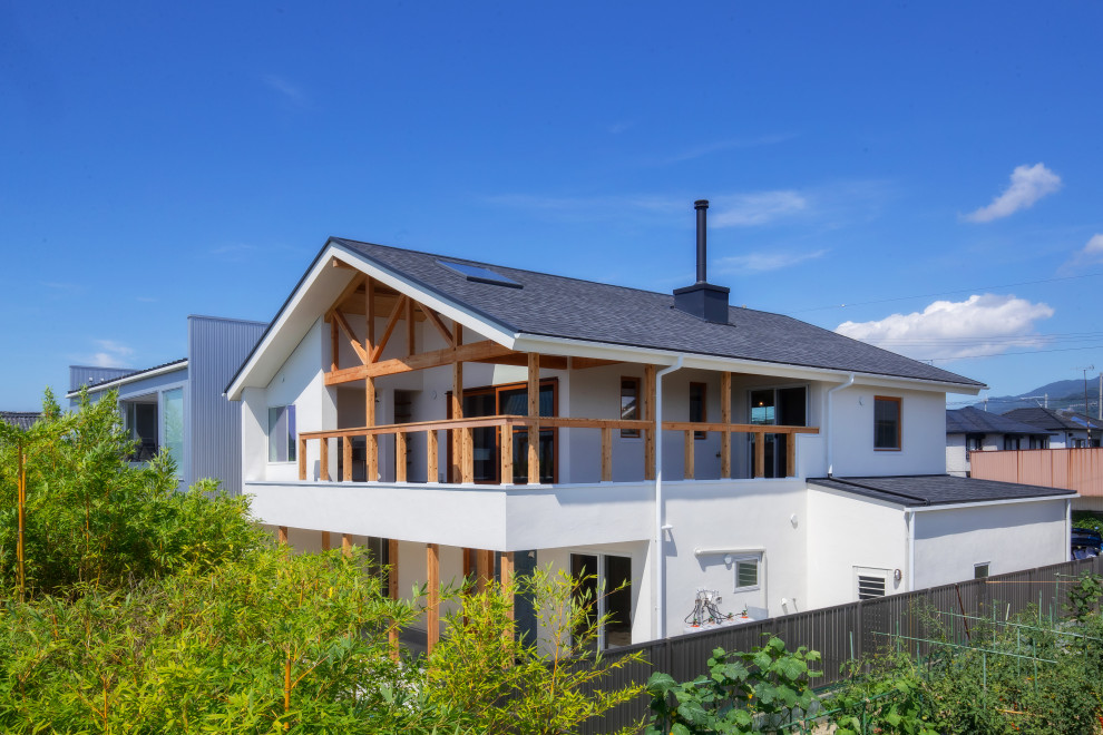 他の地域にあるおしゃれな家の外観の写真