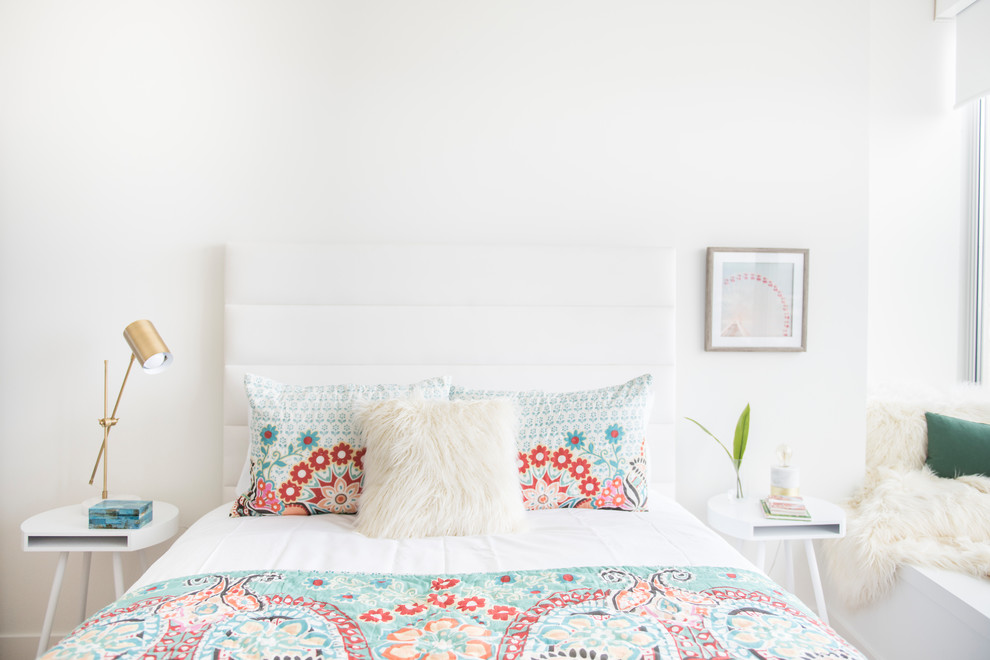 Inspiration for a mid-sized scandinavian guest light wood floor and beige floor bedroom remodel in Miami with white walls and no fireplace