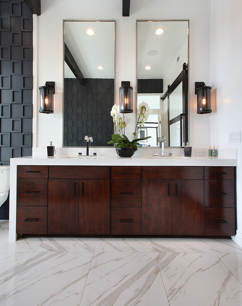 This is an example of a transitional bathroom in Orange County with flat-panel cabinets and medium wood cabinets.