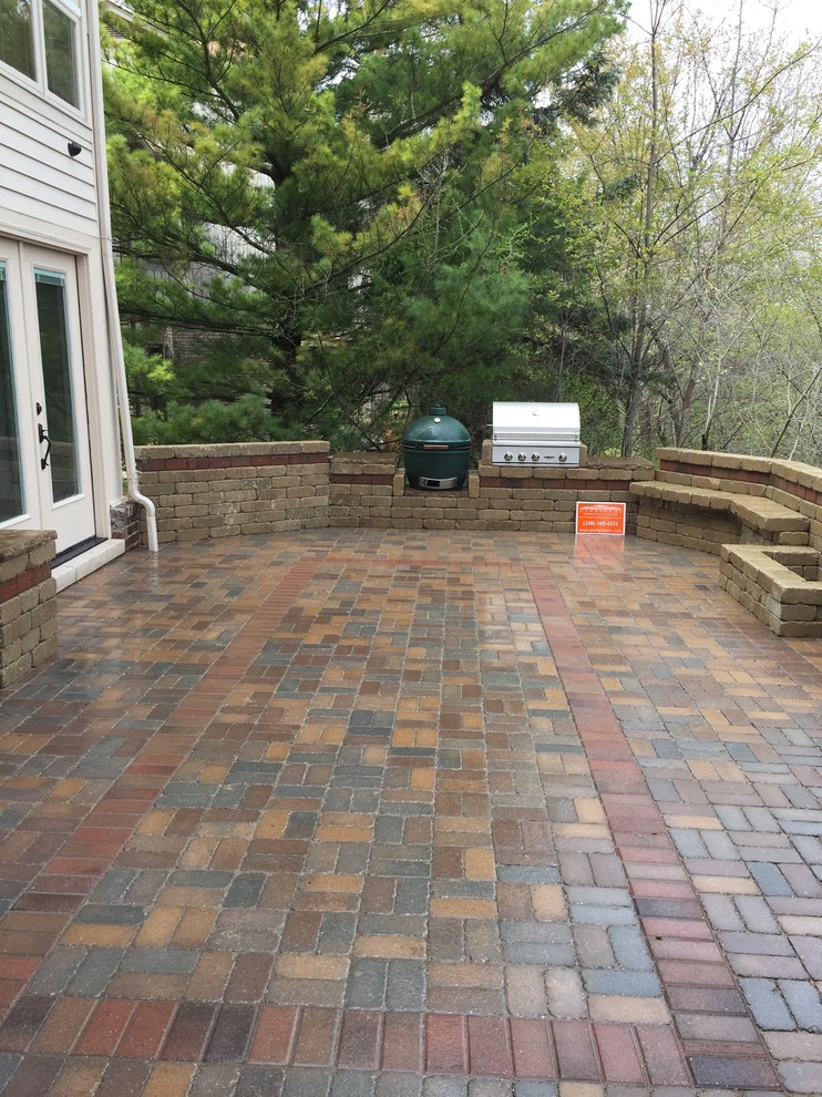 Photo of a large transitional patio in Detroit.