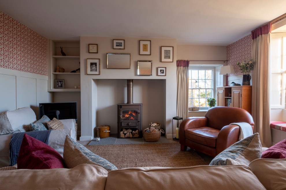 Design ideas for a country living room in Other with a wood burning stove.