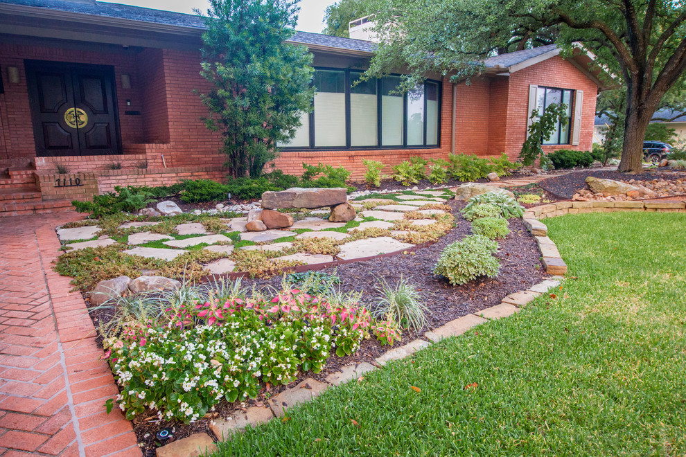 Inspiration for a large southwestern drought-tolerant and partial sun front yard stone garden path in Dallas.