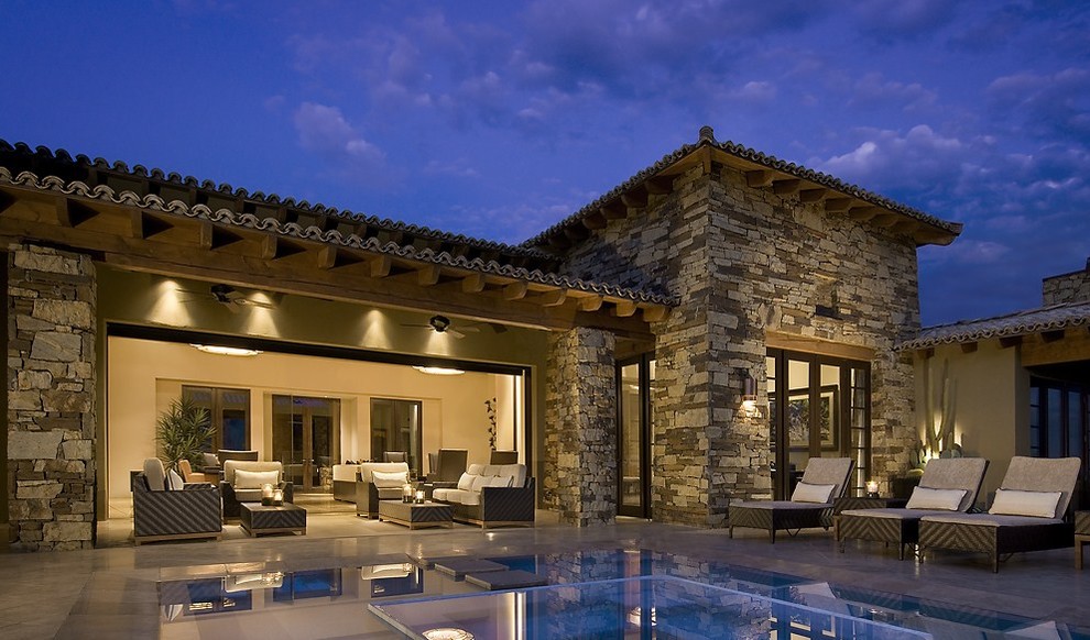 Inspiration for a mediterranean patio in Phoenix with no cover.