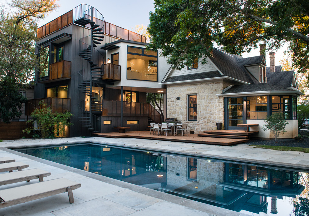Photo of a mid-sized contemporary backyard rectangular lap pool in Austin.