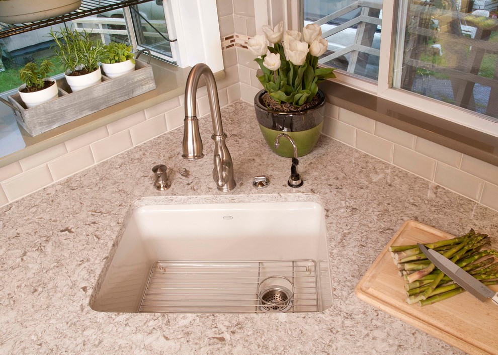 Mid-sized transitional dark wood floor kitchen photo in Seattle with an undermount sink, shaker cabinets, dark wood cabinets, beige backsplash, subway tile backsplash, stainless steel appliances and a peninsula