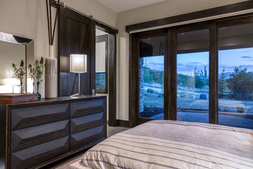Photo of a contemporary master bedroom in Salt Lake City.