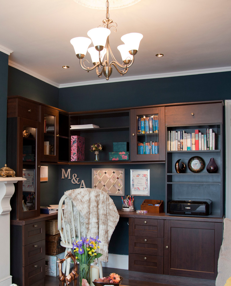 Photo of a small traditional study room in Berkshire with blue walls, vinyl floors, a built-in desk and brown floor.