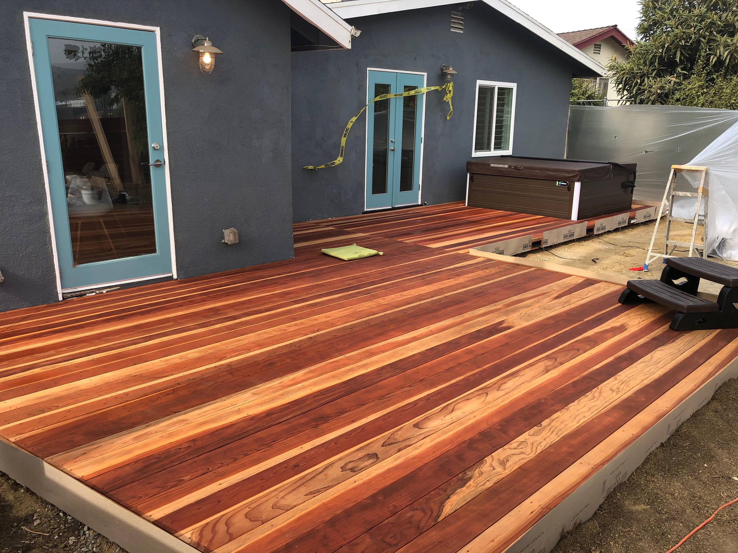 Mid-Construction Backyard Remodel Jacuzzi Deck and Fire Pit Entertainment Seatin