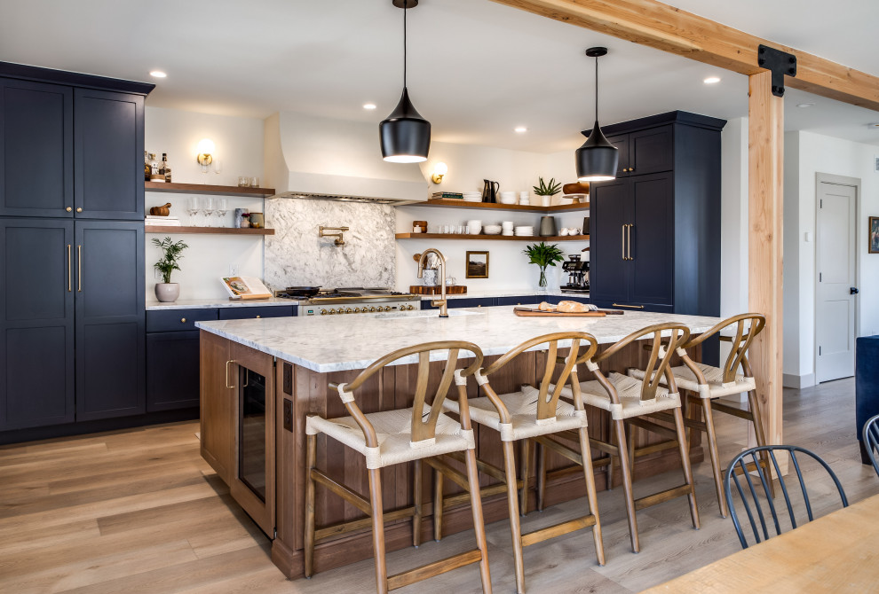Example of a transitional kitchen design in Denver