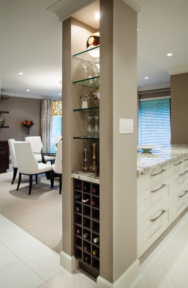 Example of a transitional home design design in Vancouver