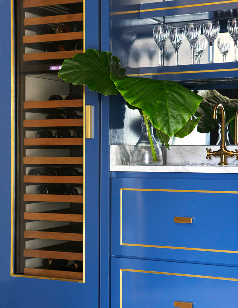 Mid-sized transitional wine cellar photo in Dallas with storage racks