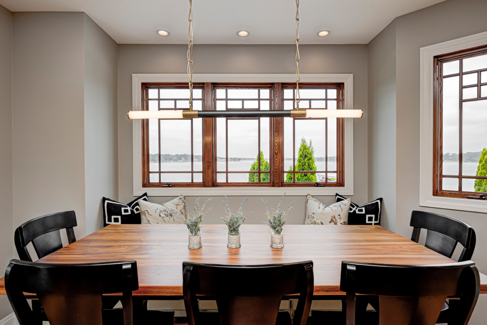 Design ideas for a contemporary enclosed dining room in Indianapolis with grey walls.