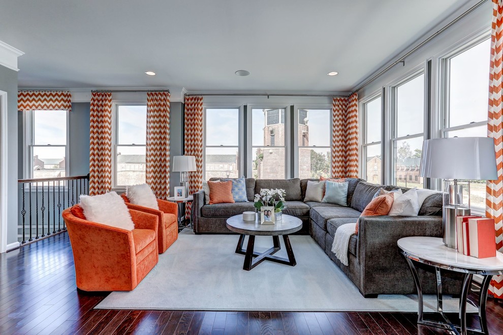Large transitional formal loft-style living room in DC Metro with grey walls, dark hardwood floors, no fireplace, no tv and brown floor.