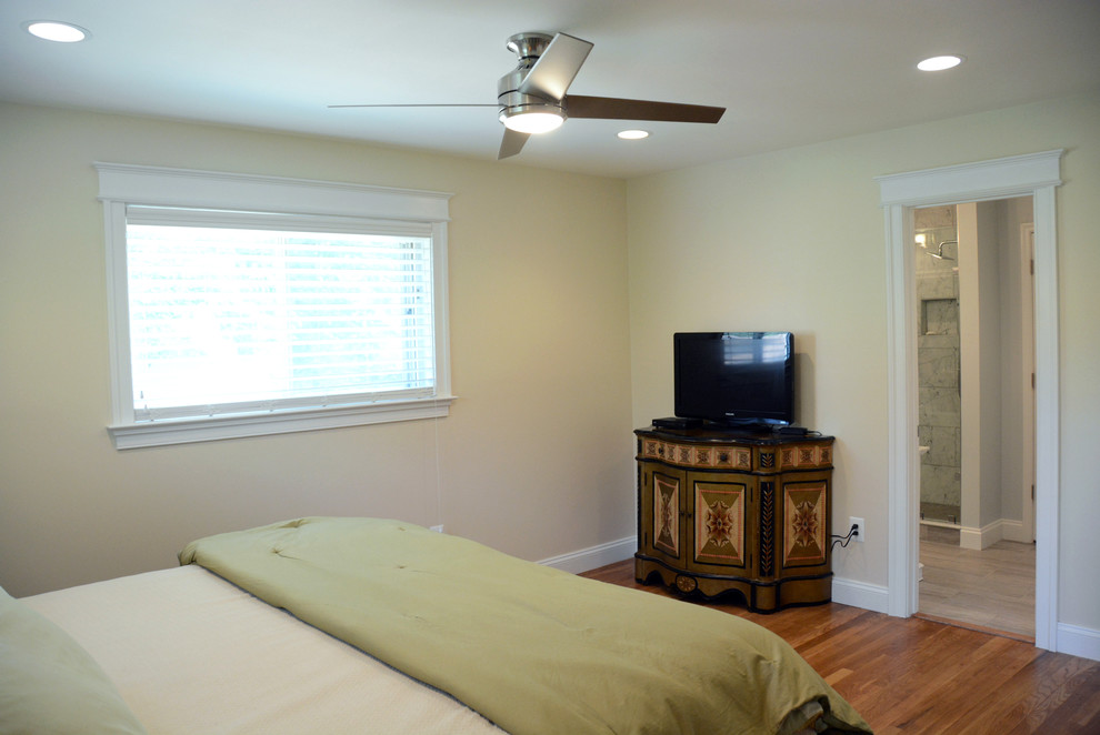 Mid-sized transitional master bedroom in DC Metro with beige walls, medium hardwood floors and no fireplace.