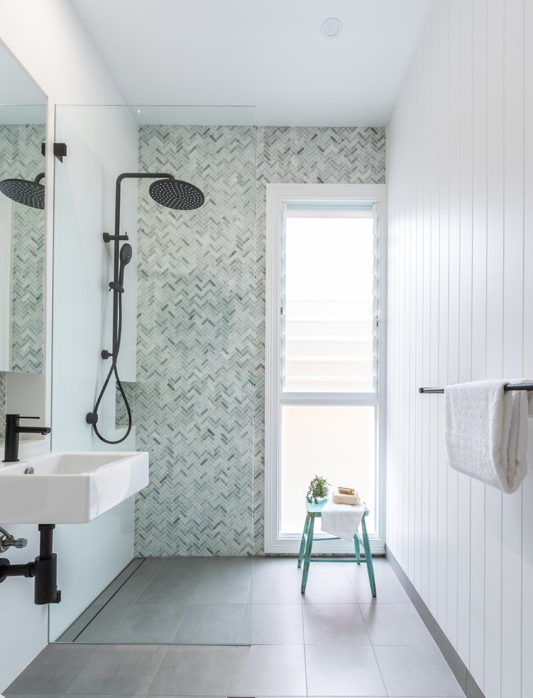 Contemporary master bathroom in Sydney with green tile, marble, white walls, ceramic floors, a wall-mount sink, a curbless shower, grey floor and an open shower.