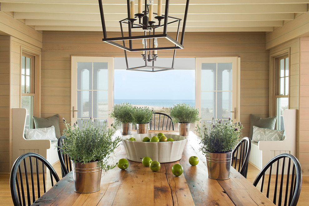 Example of a beach style medium tone wood floor great room design in Boston
