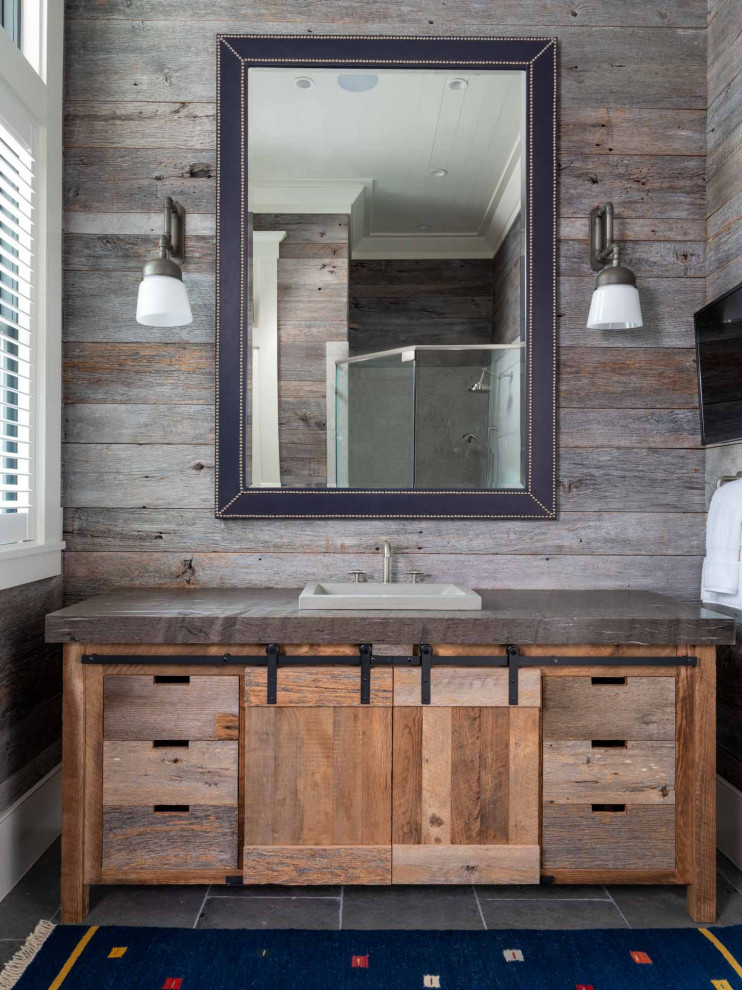 Design ideas for a rural ensuite bathroom in Other with distressed cabinets, grey walls, slate flooring, a vessel sink, concrete worktops, grey floors, grey worktops, a single sink, a freestanding vanity unit and wood walls.