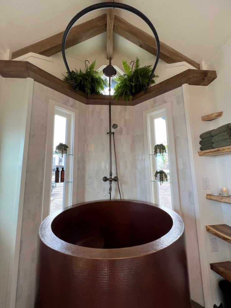 Inspiration for a mid-sized master bathroom in Hawaii with medium wood cabinets, a japanese tub, an open shower, a one-piece toilet, white tile, cement tile, white walls, a pedestal sink, a shower curtain, brown benchtops, a single vanity and a floating vanity.