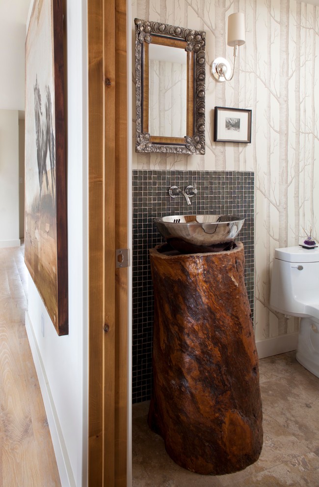 Country powder room in Denver with a vessel sink.