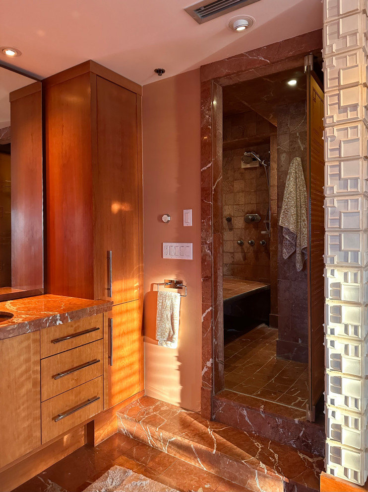 This is an example of a modern wet room bathroom in Minneapolis with a hinged door.