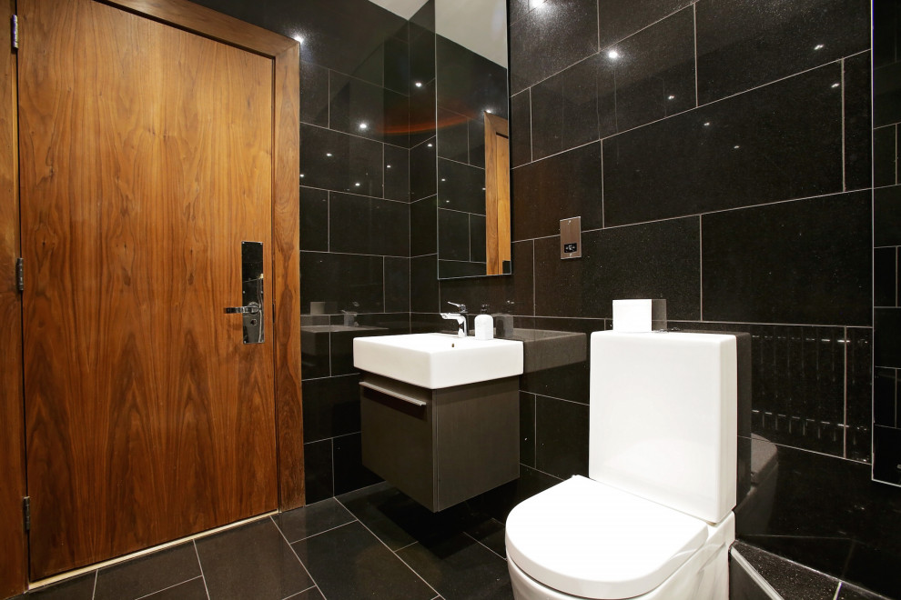 Photo of a modern powder room in London.