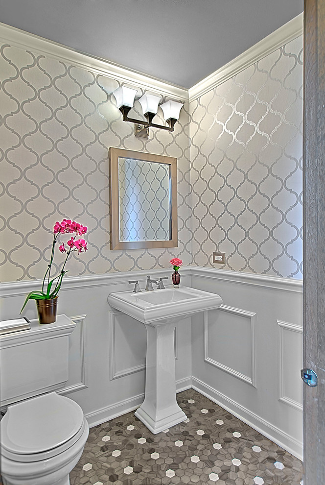 Design ideas for a small traditional powder room in Chicago with a two-piece toilet, white walls, marble floors, a pedestal sink and grey floor.