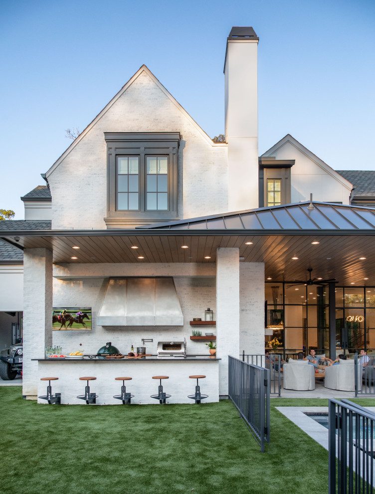 Inspiration for a huge transitional multicolored two-story mixed siding and board and batten exterior home remodel in Houston with a shingle roof and a gray roof