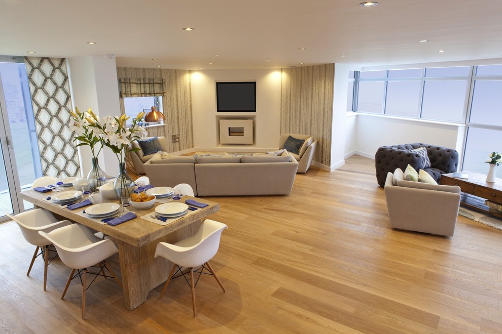 This is an example of a beach style living room in Cornwall.