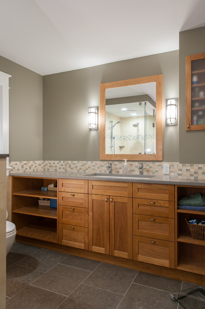 Design ideas for a large contemporary master bathroom in Burlington with shaker cabinets, medium wood cabinets, a two-piece toilet, multi-coloured tile, ceramic tile, grey walls, ceramic floors, an undermount sink, quartzite benchtops and grey floor.
