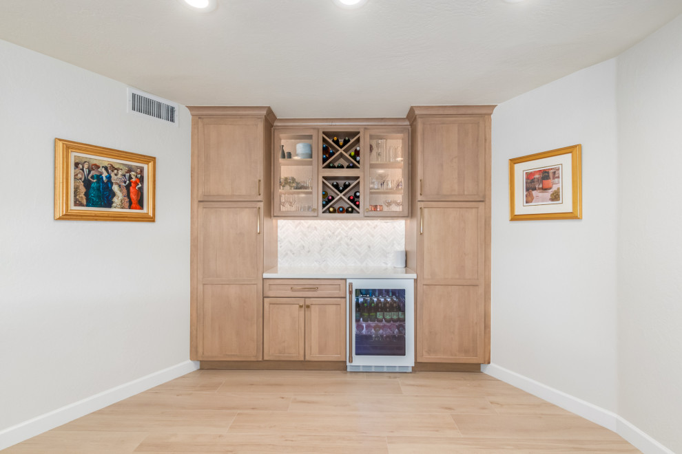 Example of a transitional home bar design in Phoenix