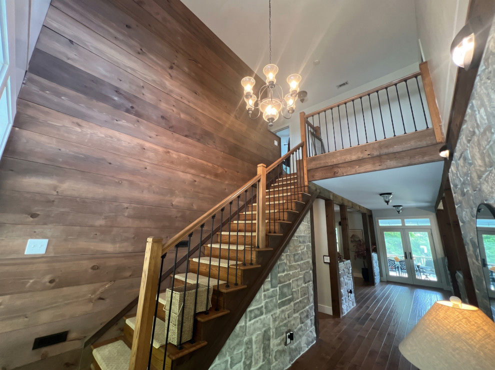 French Chalet Foyer with Extensive Stonework and Carpentry
