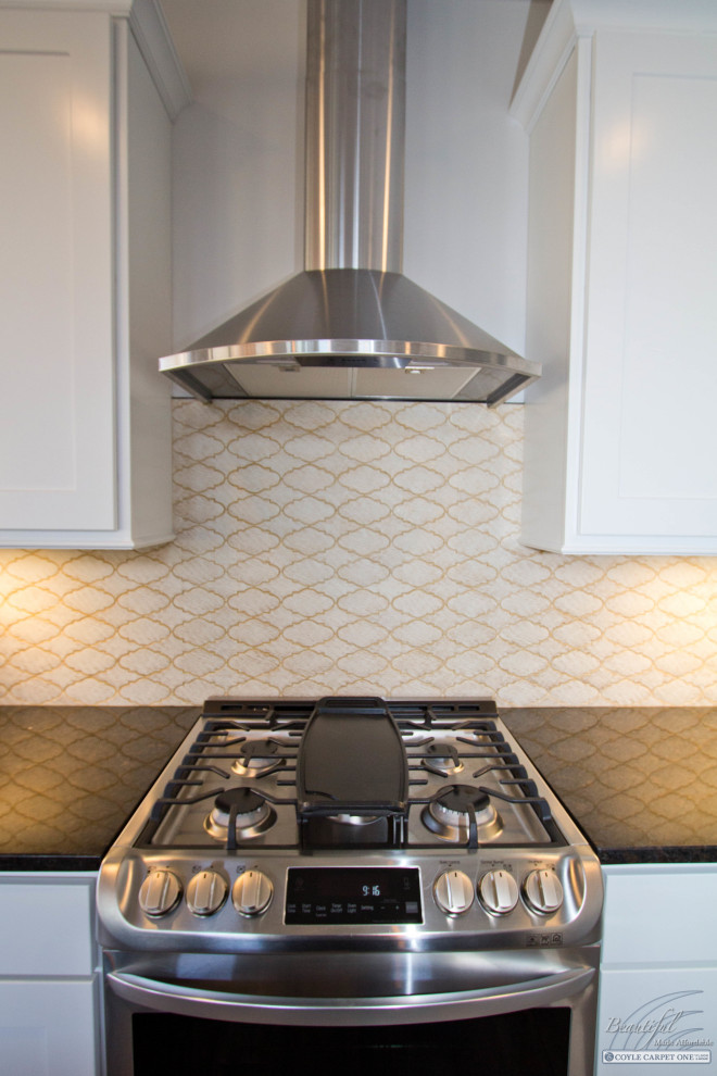 Example of a large transitional kitchen design with recessed-panel cabinets, white cabinets, yellow backsplash and mosaic tile backsplash