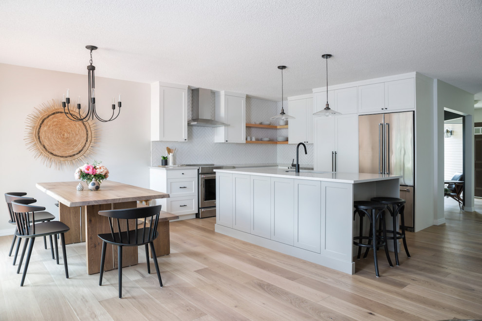 Design ideas for a transitional kitchen in Calgary.