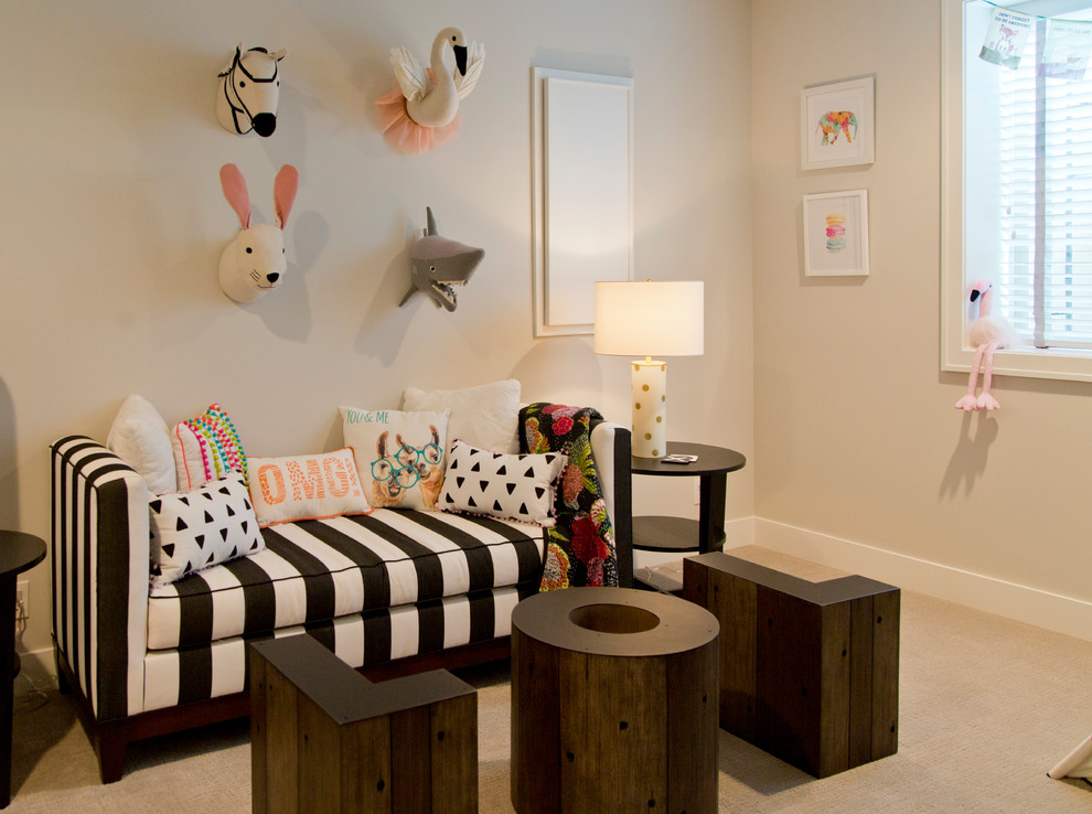 Mid-sized contemporary kids' playroom in Kansas City with beige walls, carpet and beige floor for girls.