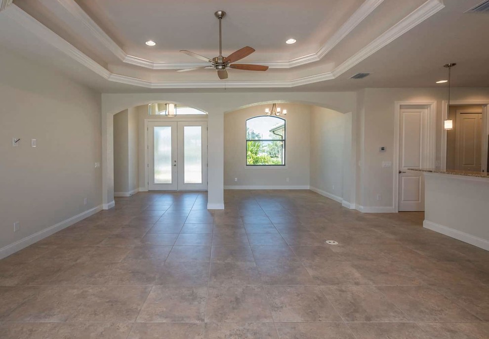 Example of a transitional home design design in Miami