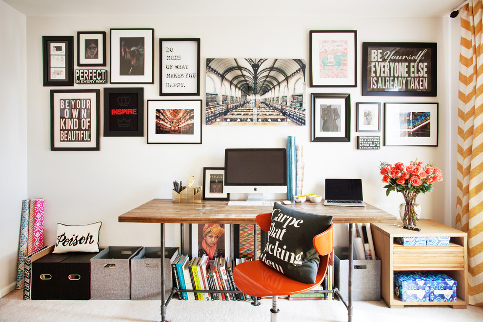 Mid-sized contemporary home office in New York with white walls, carpet, no fireplace and a freestanding desk.