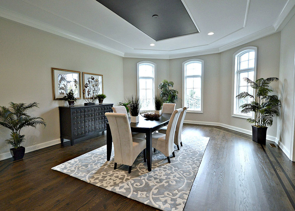 Inspiration for a contemporary separate dining room in New York with beige walls and medium hardwood floors.