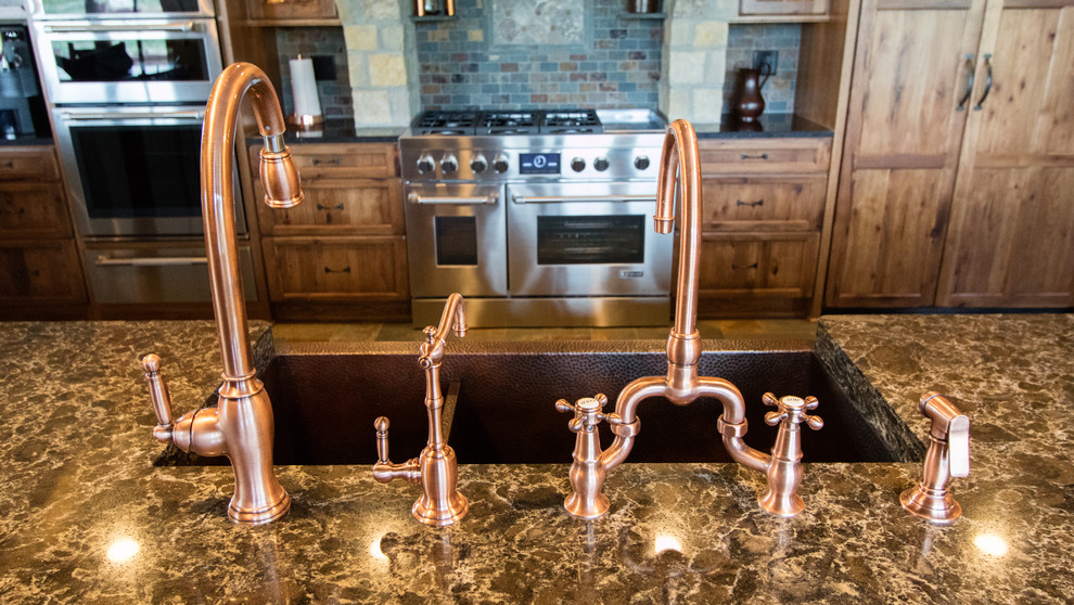 Example of a mountain style home design design in Milwaukee