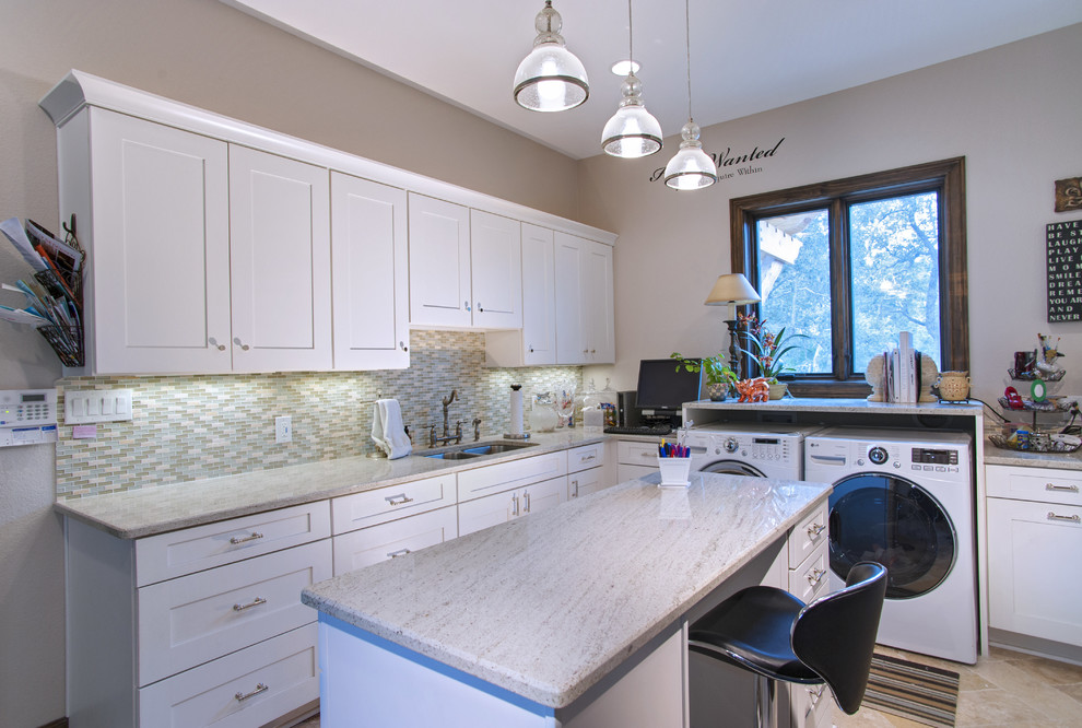 Transitional laundry room photo in Austin